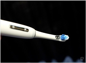 Электрическая зубная щётка